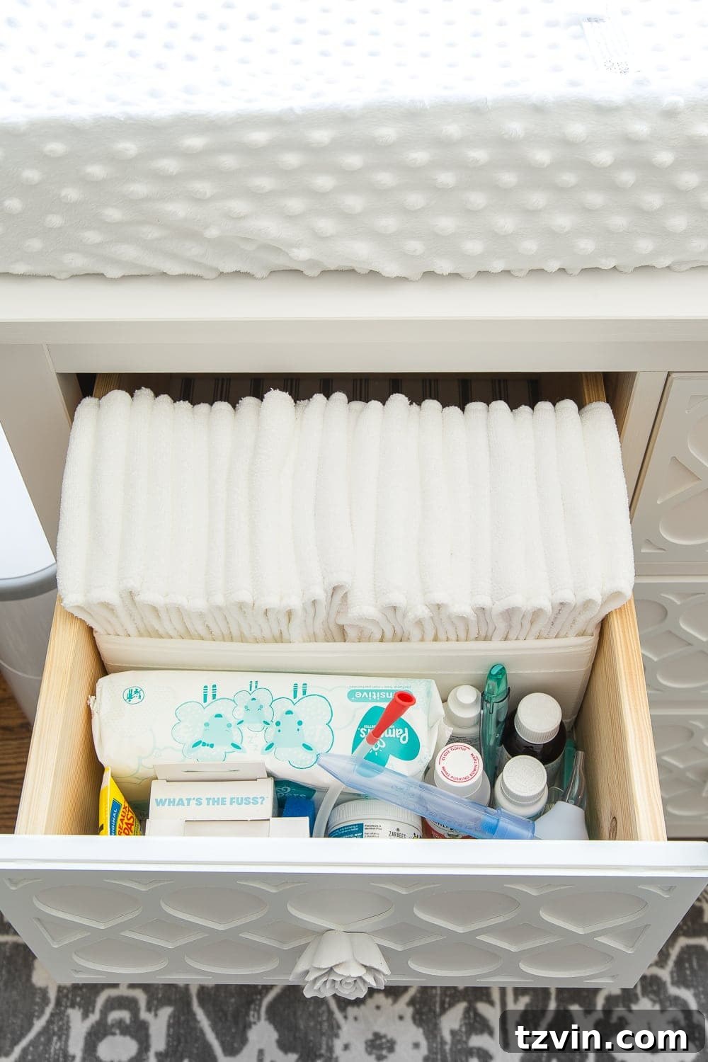 Nursery Organization Secrets Revealed 9 Nursery Organization | Dresser drawers with dividers to store cloth diaper liners, medicines, aspirator, thermometer, diaper cream, and wipes.