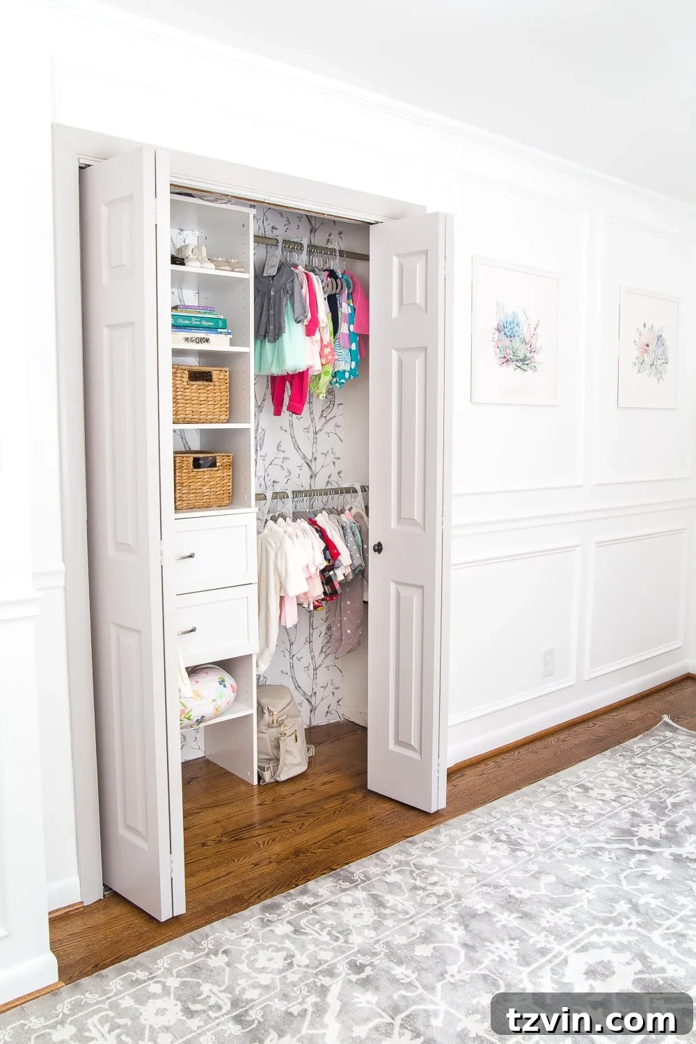 Another view of the fully organized and functional nursery closet with aesthetic appeal