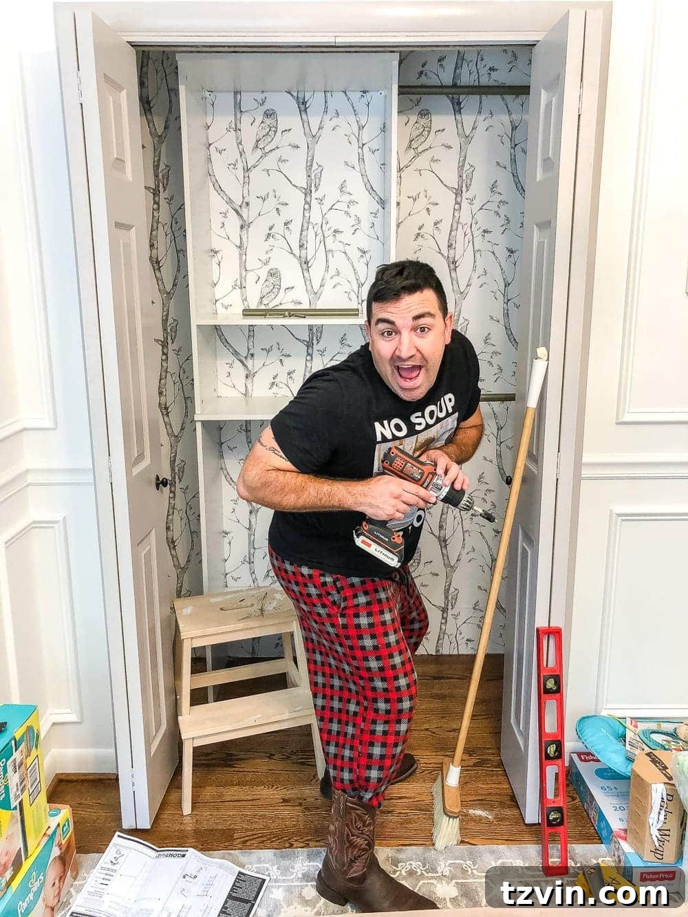 Husband installing new solid ClosetMaid shelving system in nursery closet