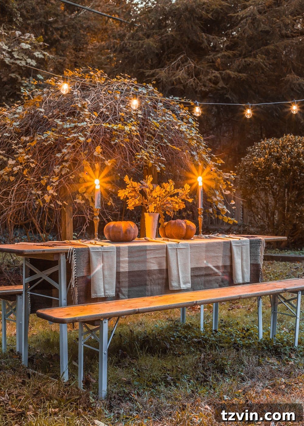 An antique beer garden table gets a modern makeover, plus a table decorating idea for an alfresco Thanksgiving. Final shot of the restored table with fall decor.