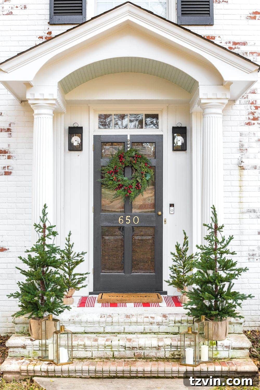 Colonial Charm Outdoor Christmas Wreaths 5 Close-up of a realistic Christmas wreath showcasing its intricate details.