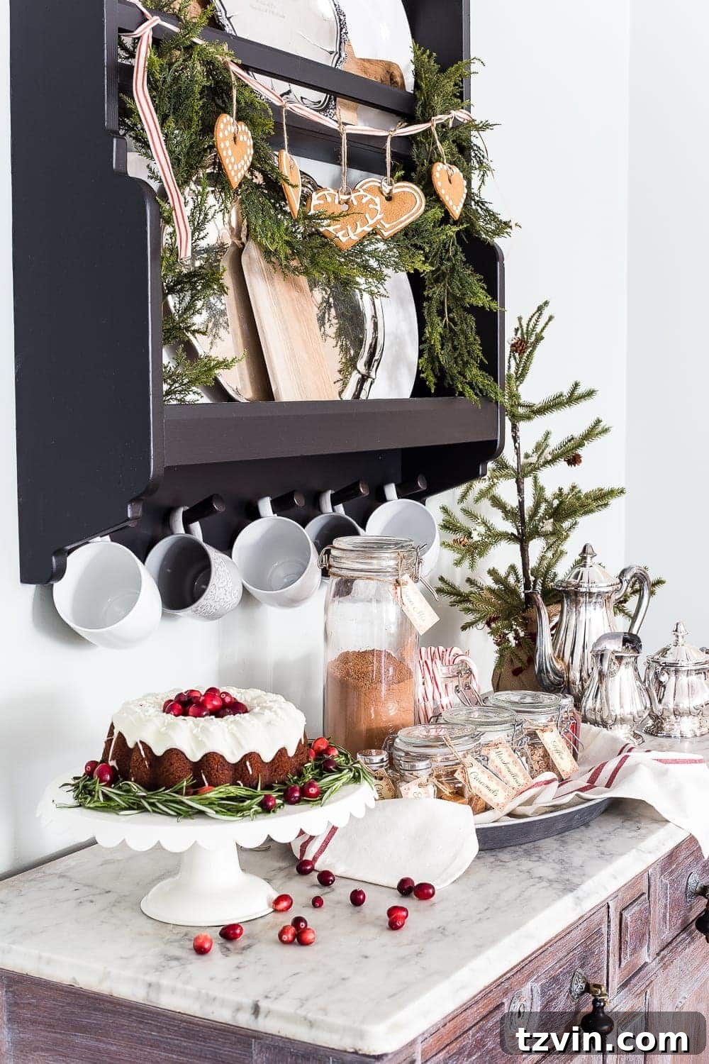 Handmade Holiday Magic: Affordable Christmas Decor for 2024 27 Thrifted silver servingware repurposed for a hot cocoa bar, adding elegant and inexpensive Christmas party decorations.