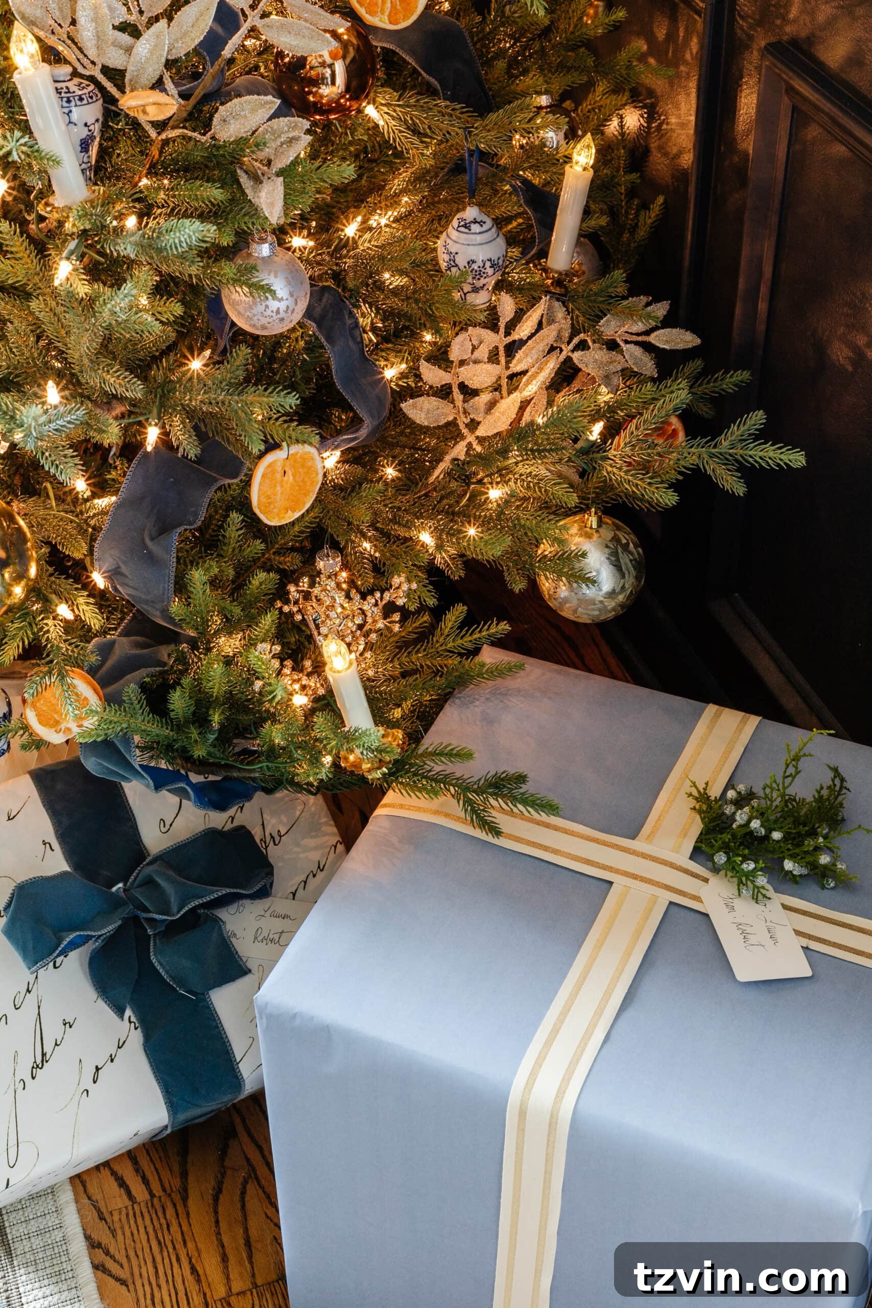 Handmade Holiday Magic: Affordable Christmas Decor for 2024 29 Blue Christmas gift wrap, featuring plain kraft paper dressed up with festive details for an elegant and inexpensive look.