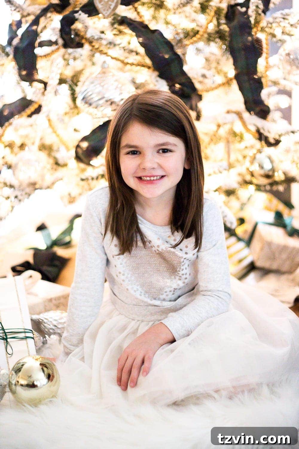 DIY Christmas Magic: Easy Family Photos at Home 9 How to take your own Christmas family photos in front of your tree, showing natural interaction