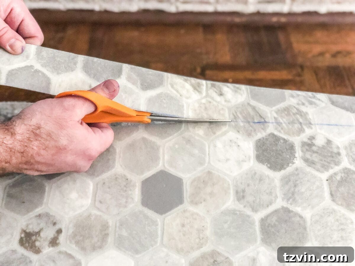 Install Sheet Vinyl Flooring Over Tile The Easy DIY Way 15 Cutting a sheet vinyl template with sharp scissors for flooring installation