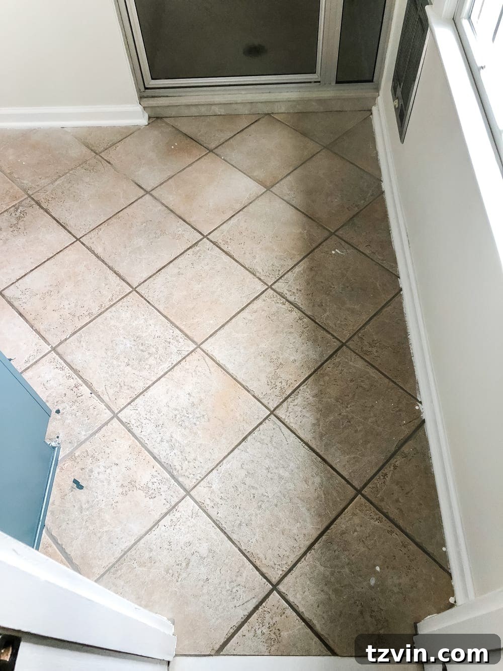 Install Sheet Vinyl Flooring Over Tile The Easy DIY Way 3 Old ceramic tile flooring in a bathroom before renovation