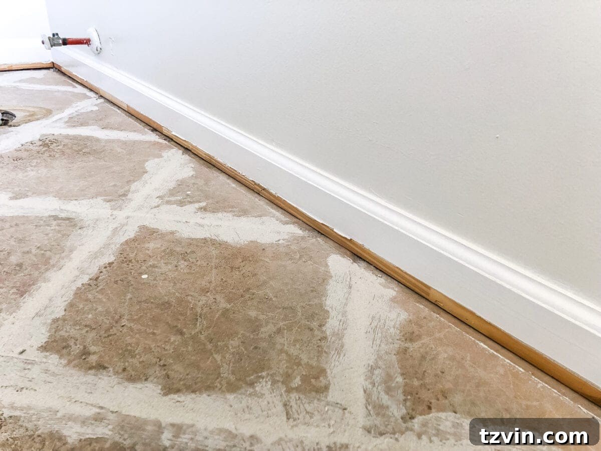 Install Sheet Vinyl Flooring Over Tile The Easy DIY Way 9 Removing shoe molding and baseboards before flooring installation