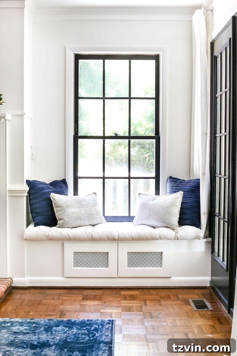 15 Stylish Secrets to Hide Household Eyesores 9 window seat with TV component storage inside