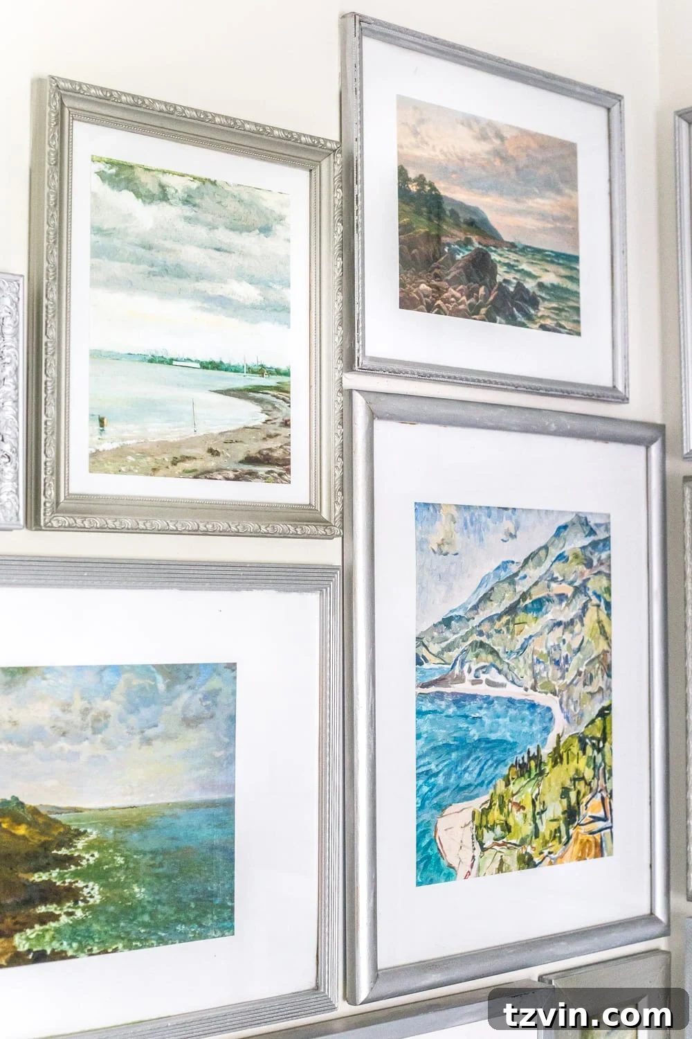 Master Bathroom Makeover: Stunning Results On A Budget 18 Detail shot of a framed printable coastal landscape art on the gallery wall