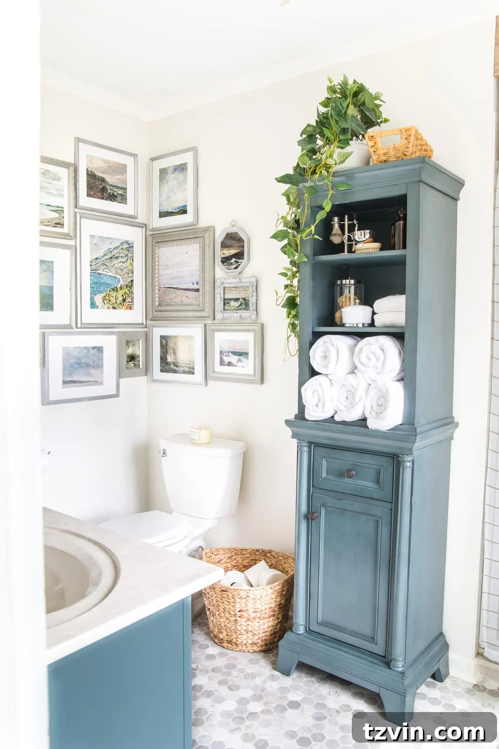 Master Bathroom Makeover: Stunning Results On A Budget 19 Linen cabinet in refreshed master bathroom with gallery wall