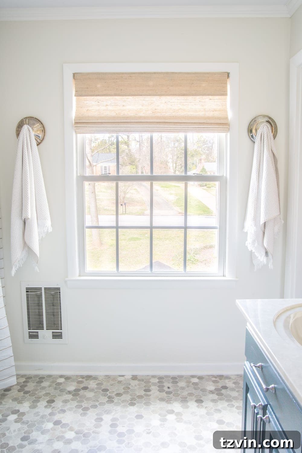 Master Bathroom Makeover: Stunning Results On A Budget 25 Woven wood shade installed in master bathroom window, adding privacy and natural texture