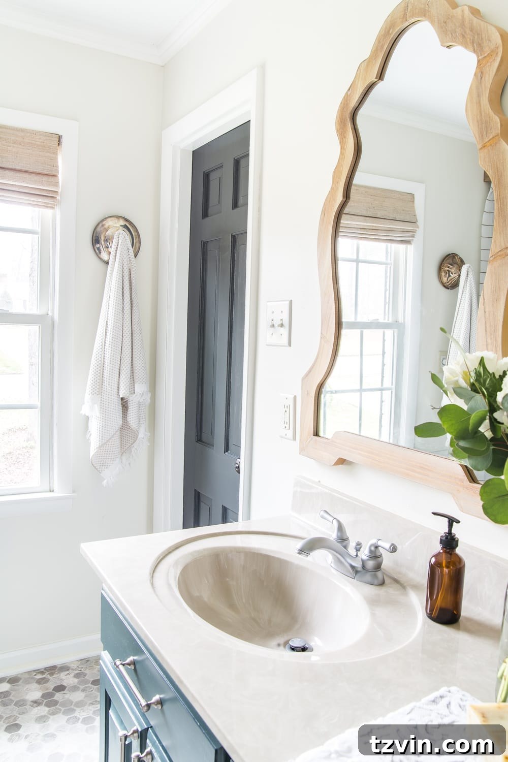 Master Bathroom Makeover: Stunning Results On A Budget 29 Master bathroom door painted in Benjamin Moore Wrought Iron, contrasting with White Dove walls