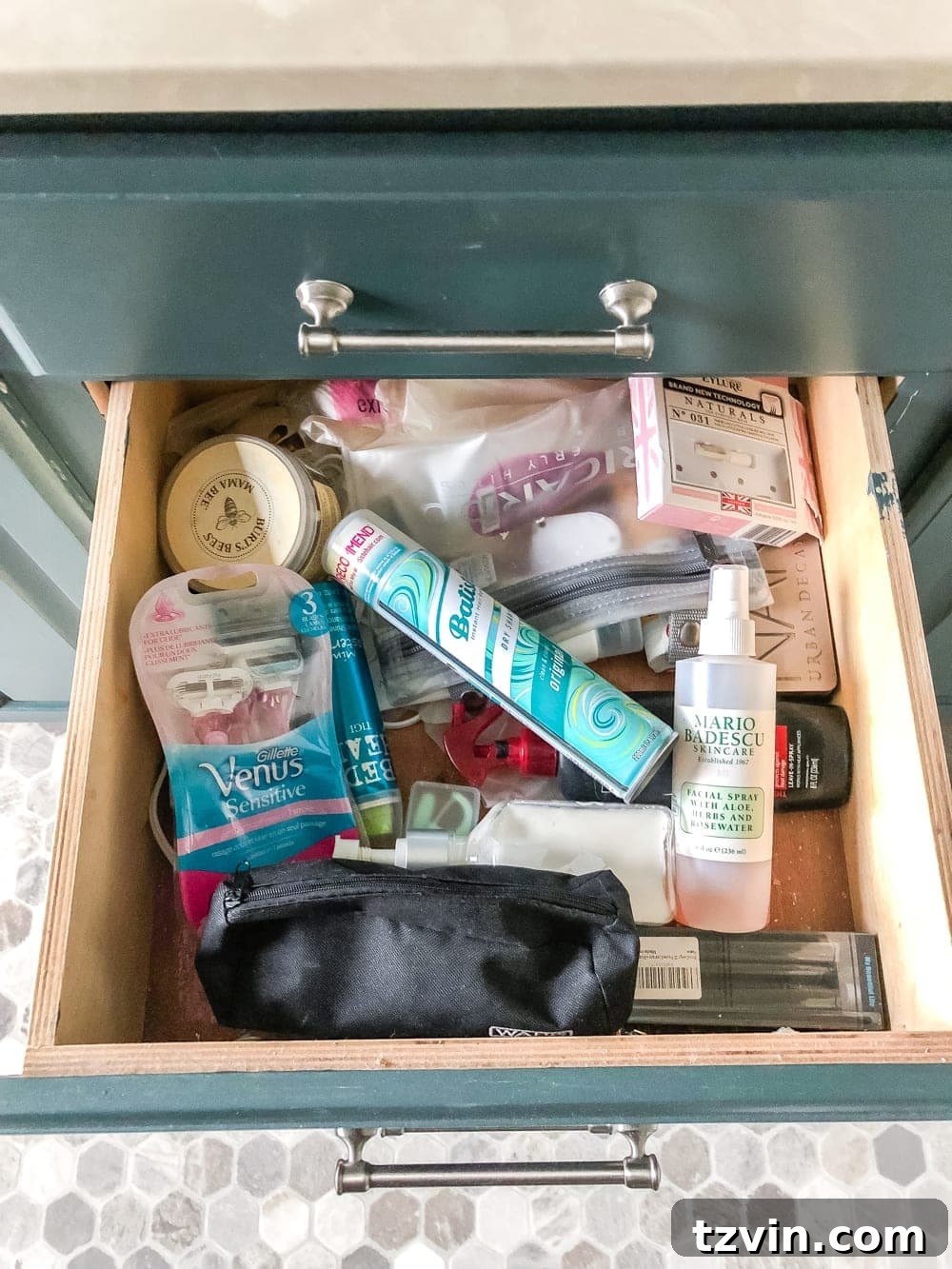 Master Bathroom Makeover: Stunning Results On A Budget 7 Organized bathroom vanity drawer with clear plastic organizers and essentials