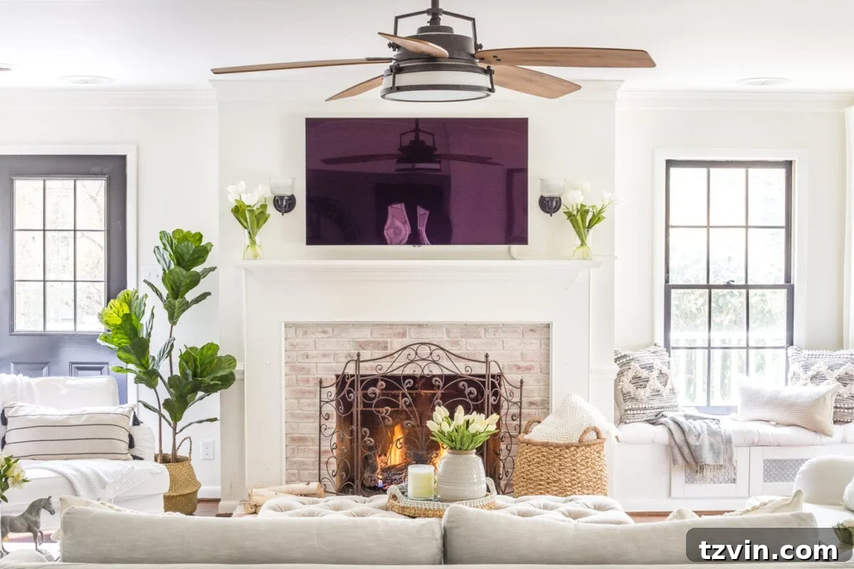 My Spring Oasis: A Home Tour 13 Neutral living room decorated for spring with subtle floral accents and comfortable seating.