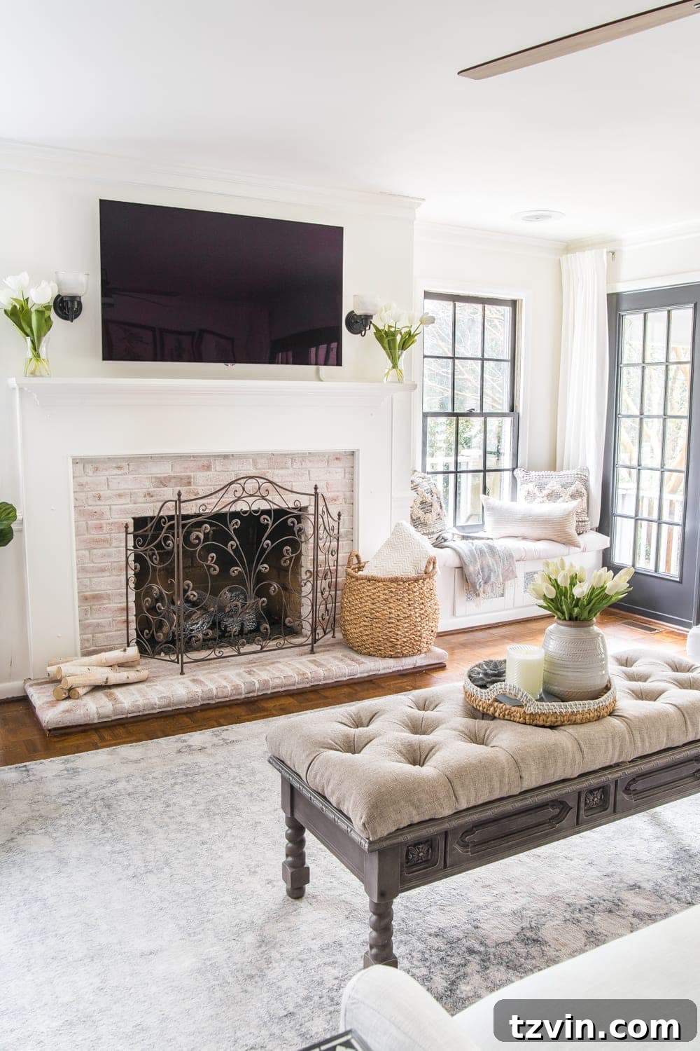 My Spring Oasis: A Home Tour 14 Living room mantelpiece adorned with minimal spring decor, focusing on neutrals and texture.