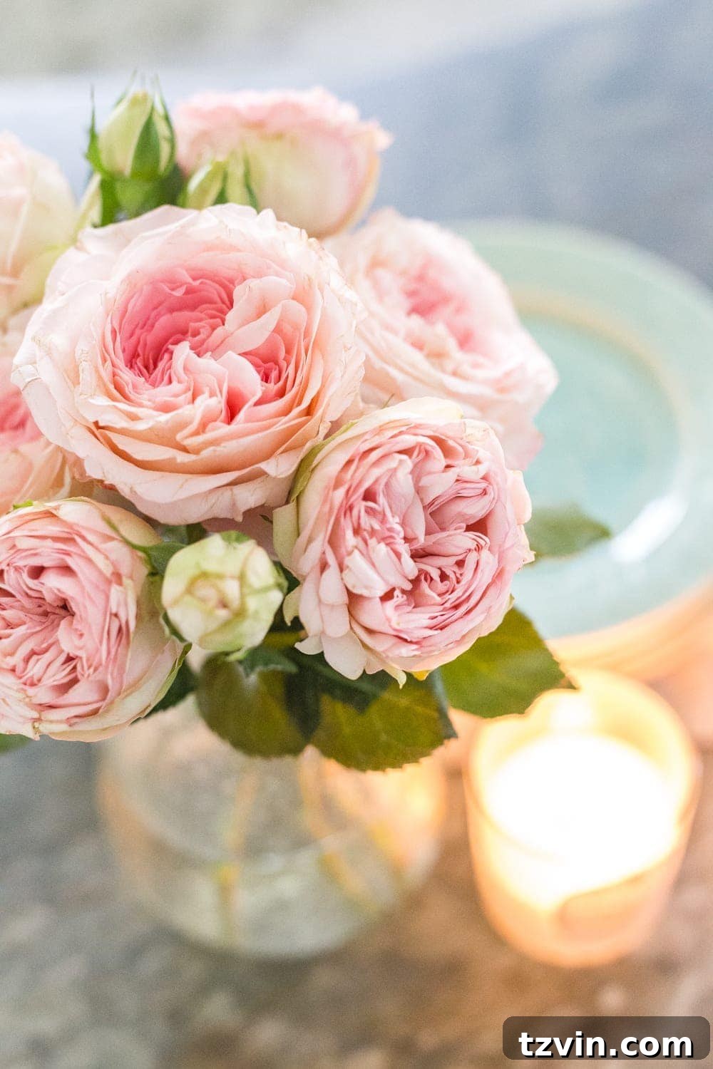 My Spring Oasis: A Home Tour 9 Blush cabbage roses in a kitchen setting, adding a soft pop of color for spring.