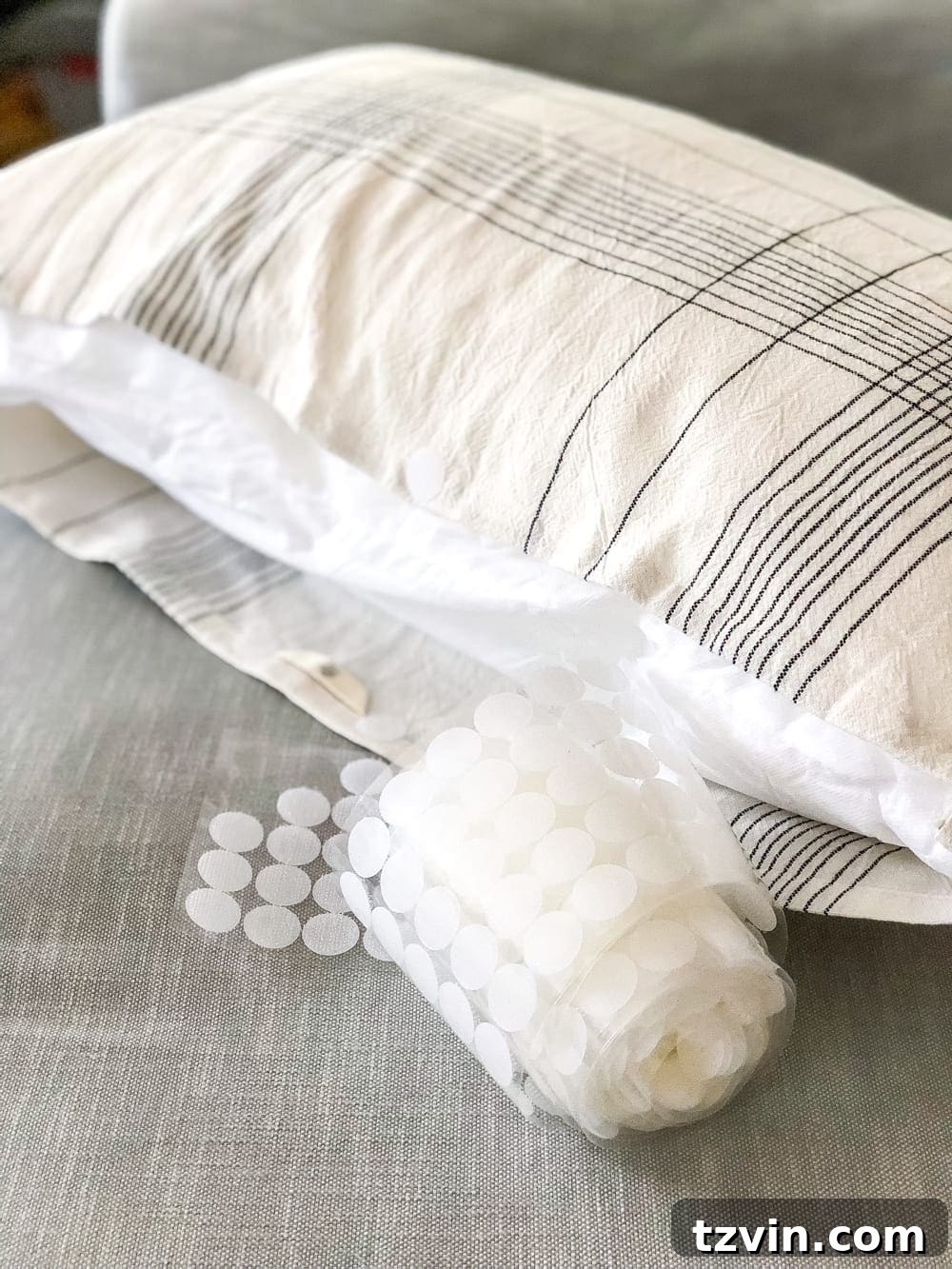 Unlock Stunning Throw Pillows with 3 Repurposed Items 8 How to make a throw pillow from a kitchen towel using a simple no-sew method