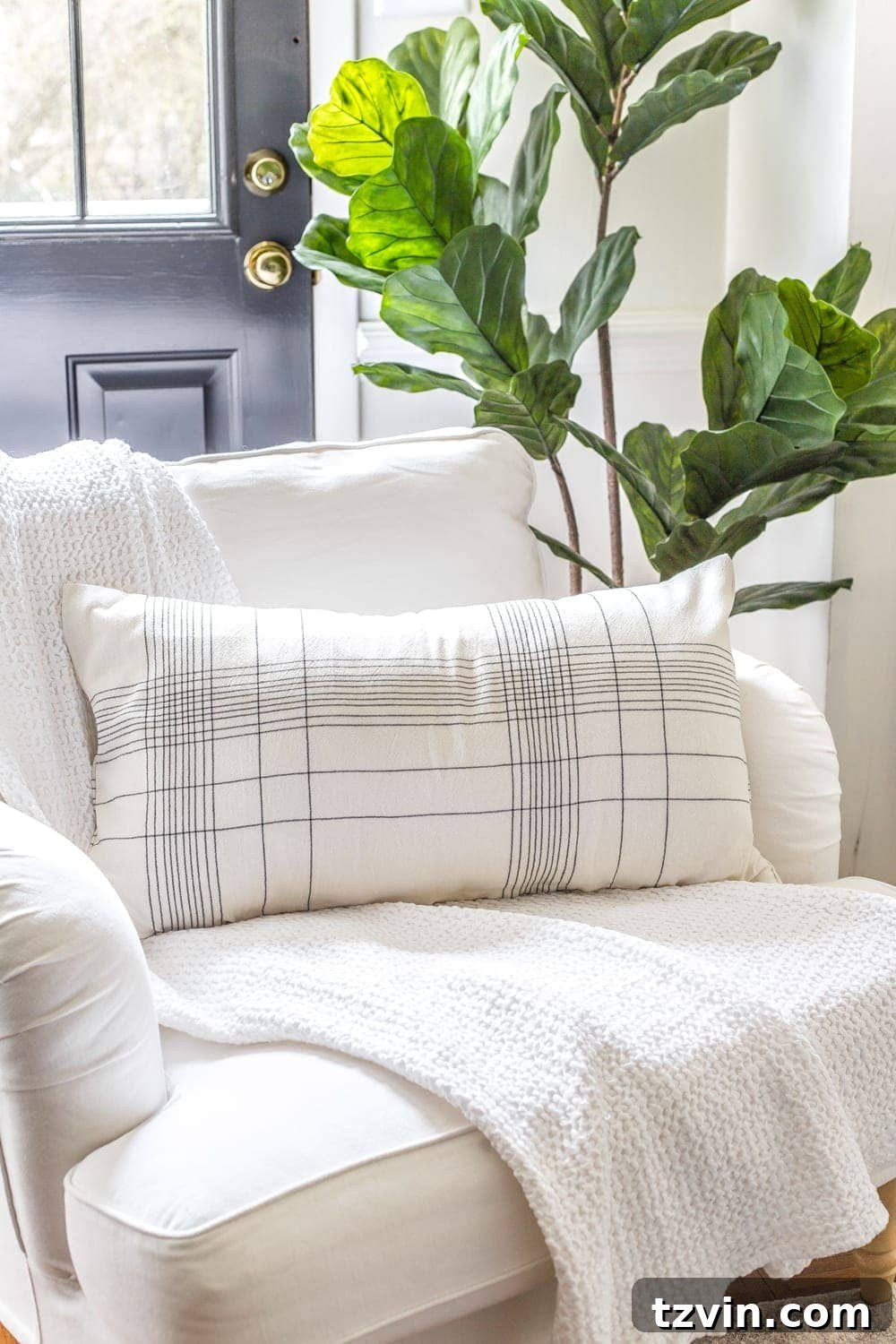 Unlock Stunning Throw Pillows with 3 Repurposed Items 9 Stylish DIY no-sew throw pillow crafted from a kitchen towel, showcasing its elegant finish