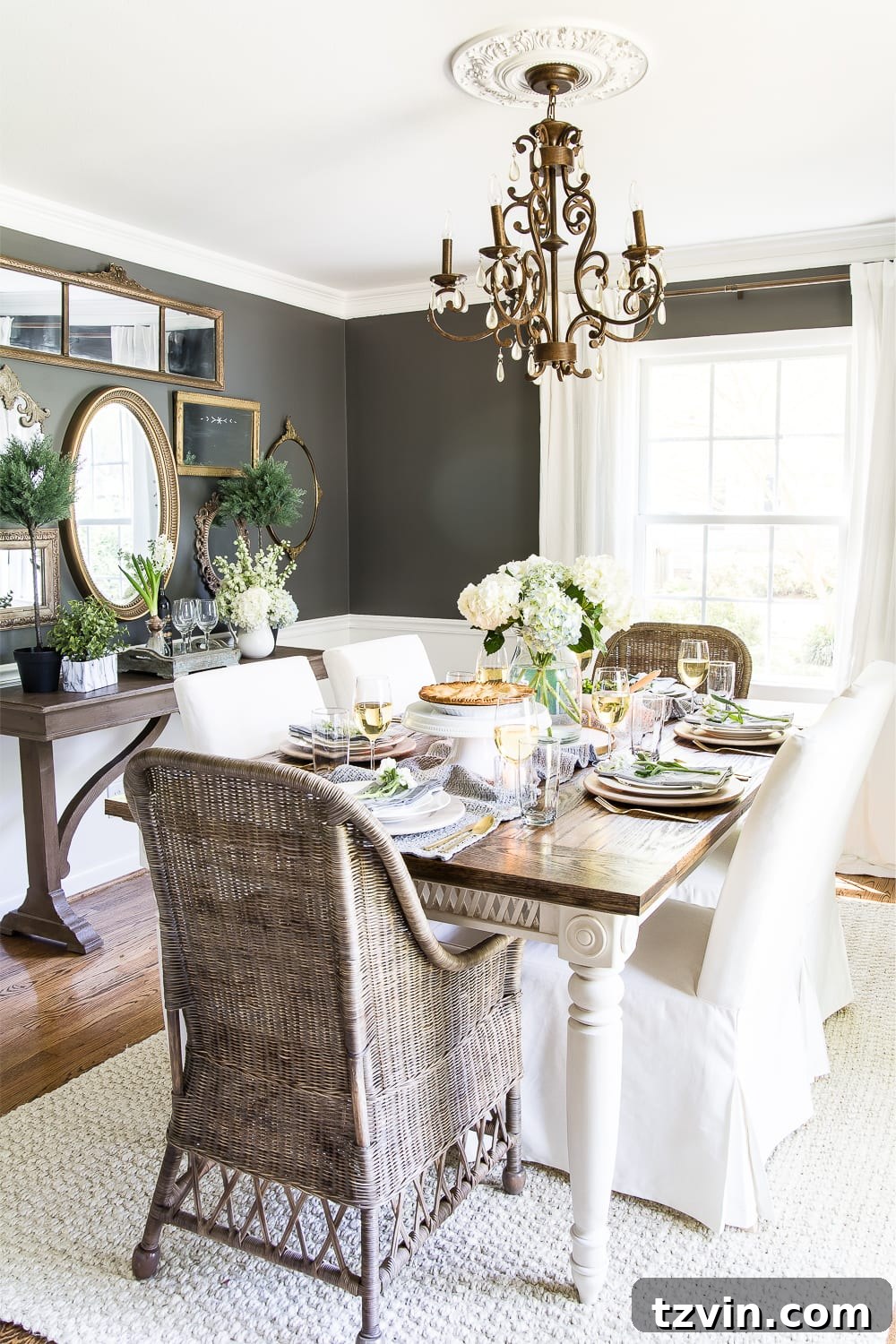 Two Years In: Our Home's Stunning Before and After 11 Close-up of a farmhouse-style dining table centerpiece with natural elements in a beautifully renovated dining room.