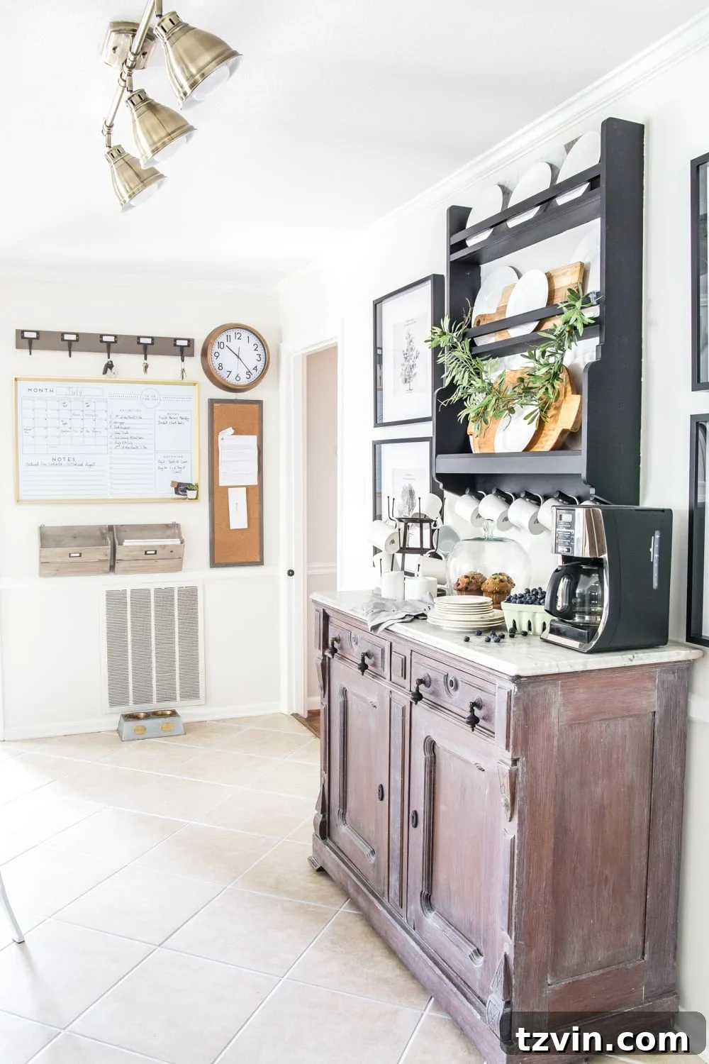 Two Years In: Our Home's Stunning Before and After 15 Detailed shot of the kitchen sink area with updated fixtures, a stylish backsplash, and farmhouse-inspired accessories.