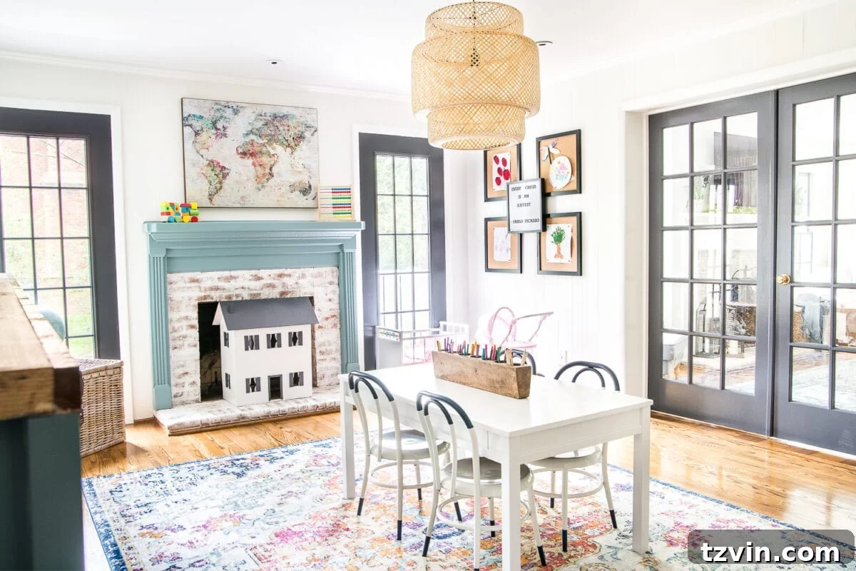 Two Years In: Our Home's Stunning Before and After 35 Wide shot of the playroom with a comfortable reading nook, patterned wallpaper, and abundant natural light.