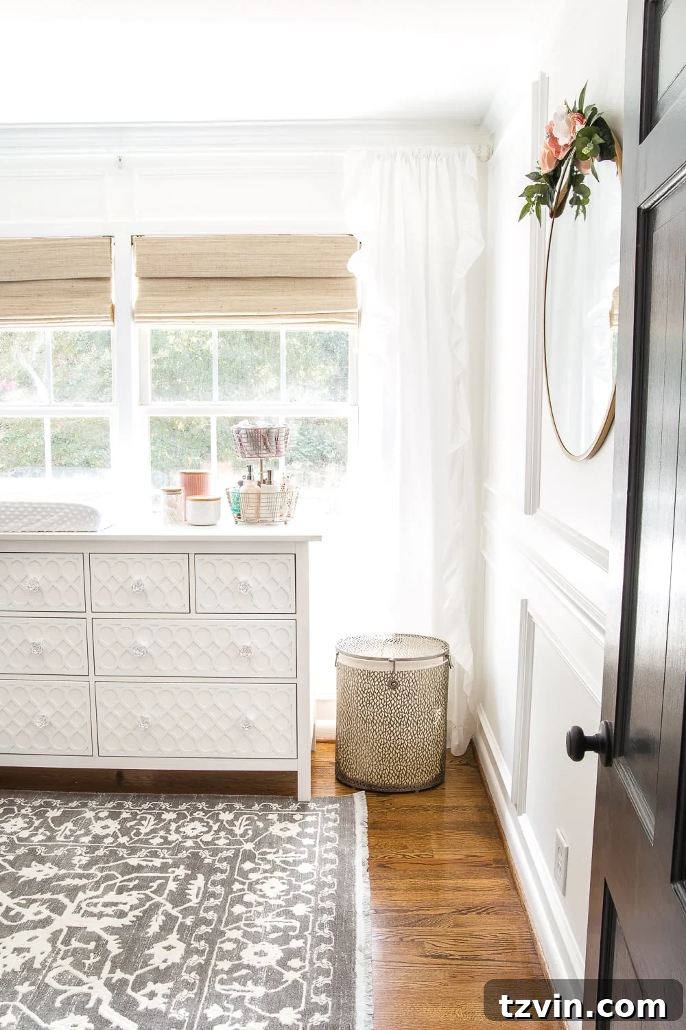 Two Years In: Our Home's Stunning Before and After 48 Detailed view of the nursery showing a cozy crib, delicate bedding, and a calming aesthetic perfect for a baby.