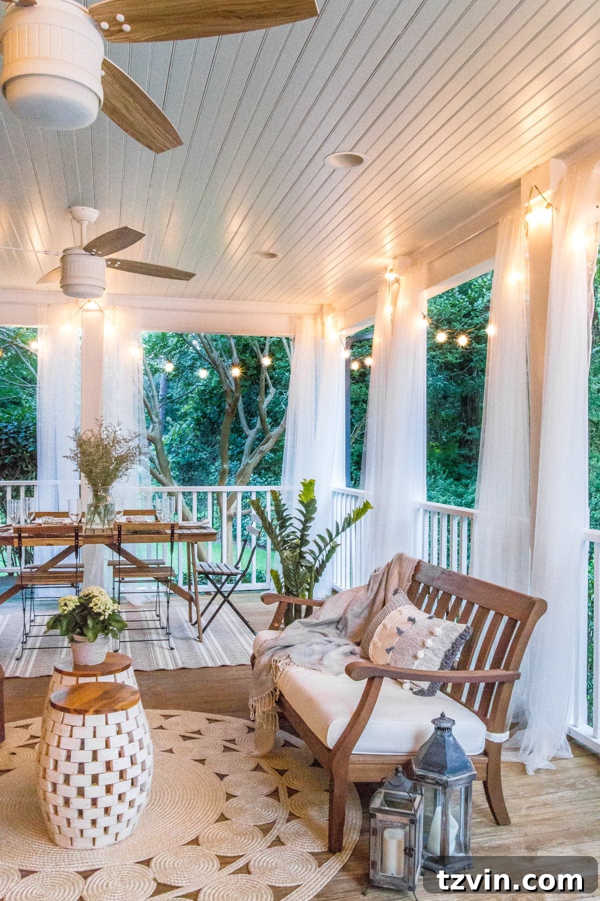 Two Years In: Our Home's Stunning Before and After 66 Wide shot of the back porch, highlighting the seamless transition from indoor to outdoor living with stylish and comfortable furnishings.