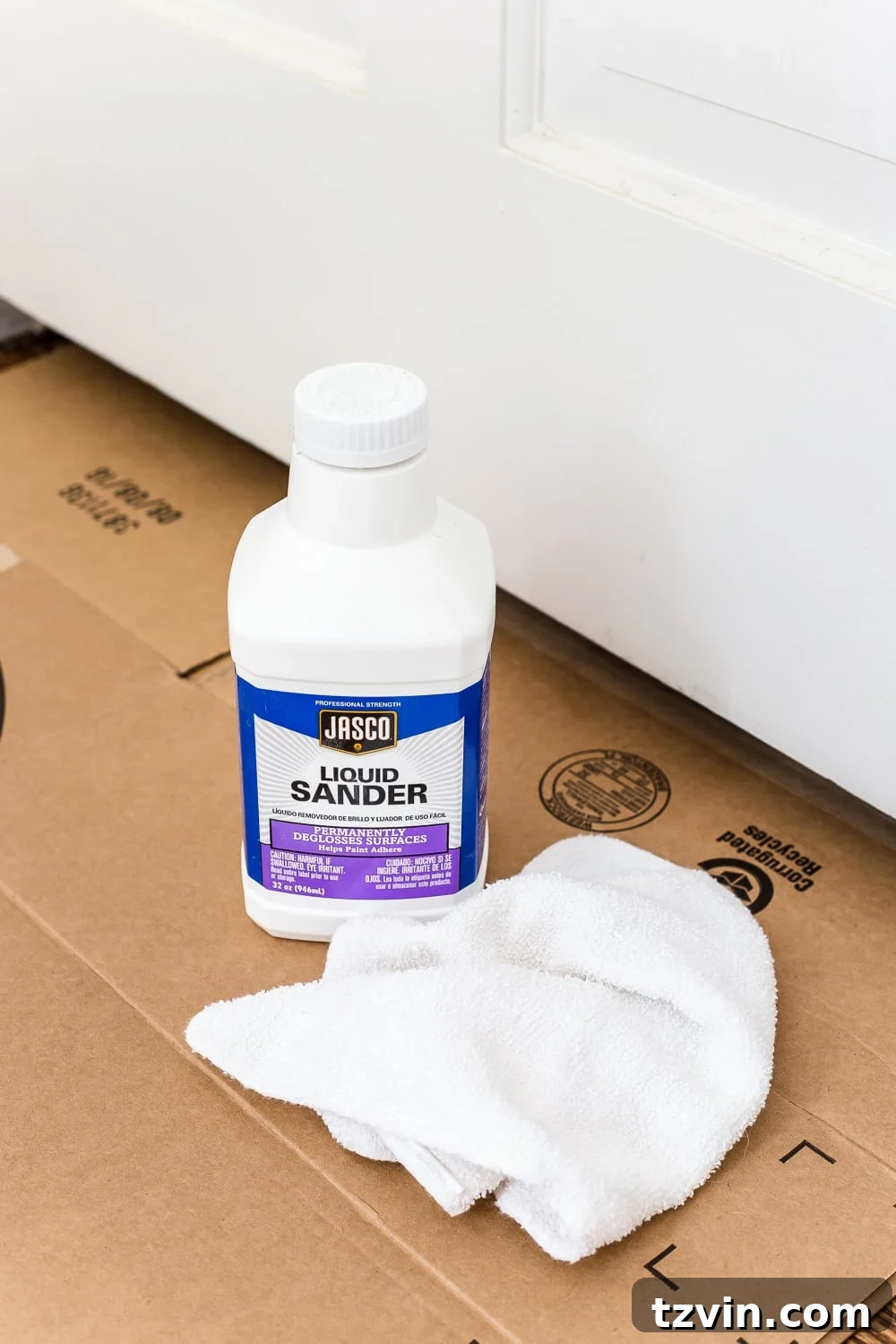 Mastering Paint on IKEA Laminate Furniture 6 Applying liquid deglosser to laminate furniture surface