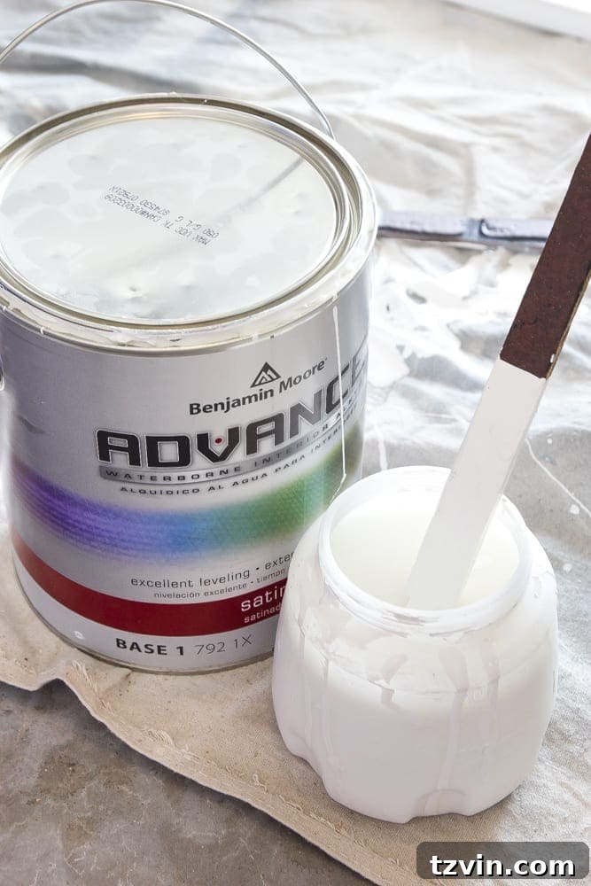 Mastering Paint on IKEA Laminate Furniture 8 Applying enamel paint to primed IKEA furniture for a custom finish
