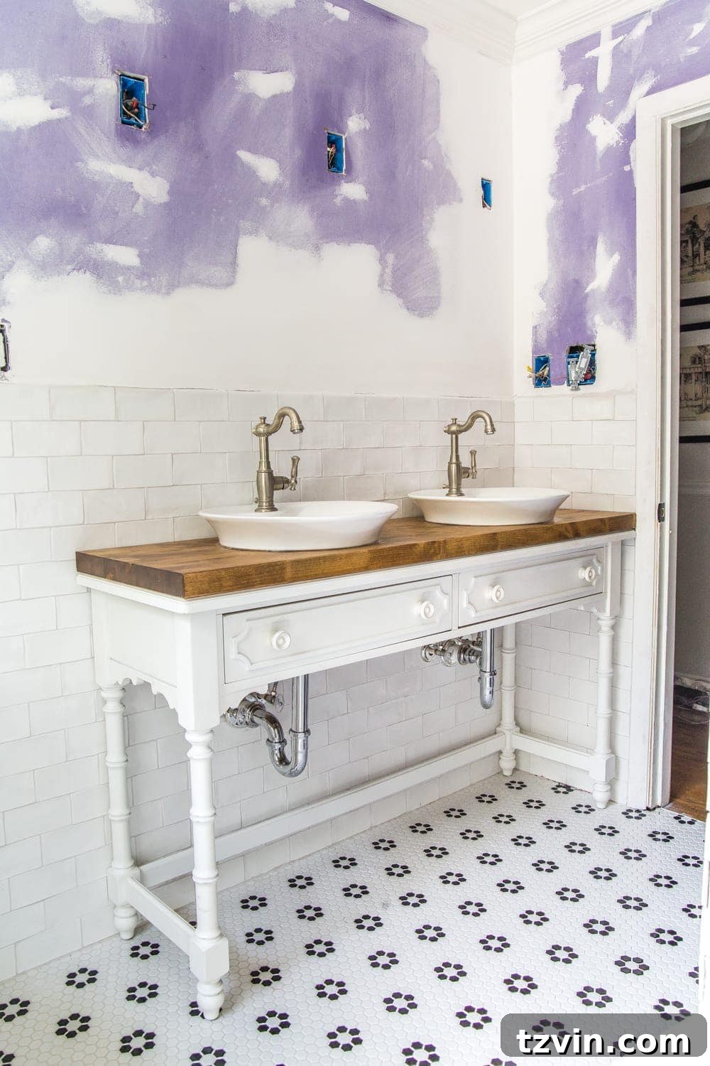 Upcycling a Console Table into a Chic Bathroom Vanity 16 Close-up of the repurposed console table vanity and new tile floor