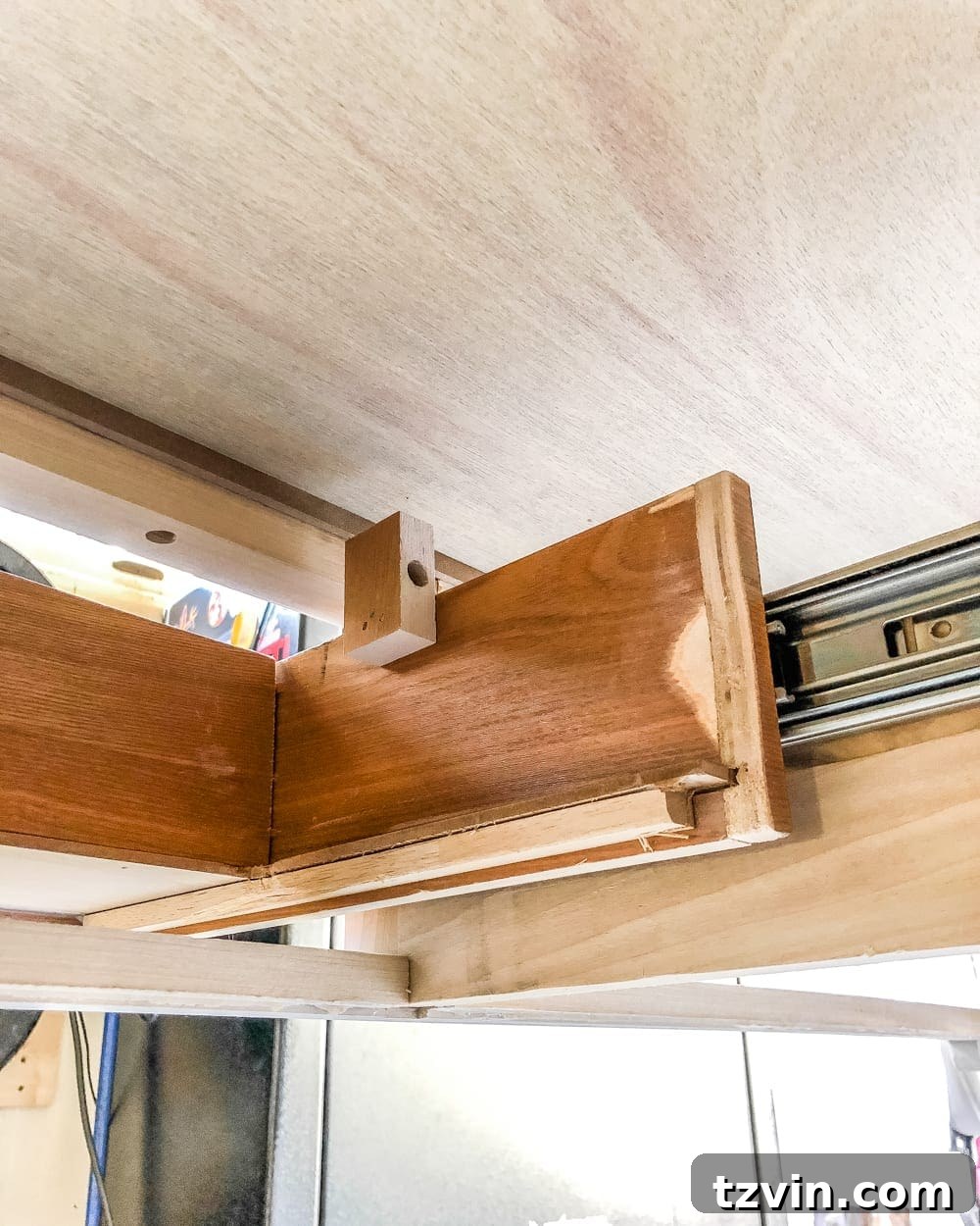 Upcycling a Console Table into a Chic Bathroom Vanity 6 Measuring and marking drawer for sink drain clearance