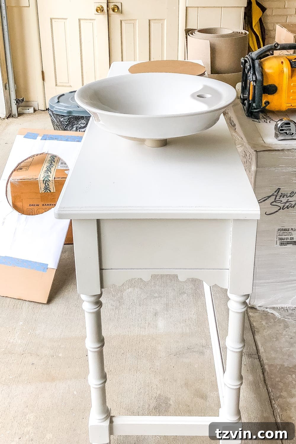 Upcycling a Console Table into a Chic Bathroom Vanity 8 Tracing vessel sink template onto the countertop