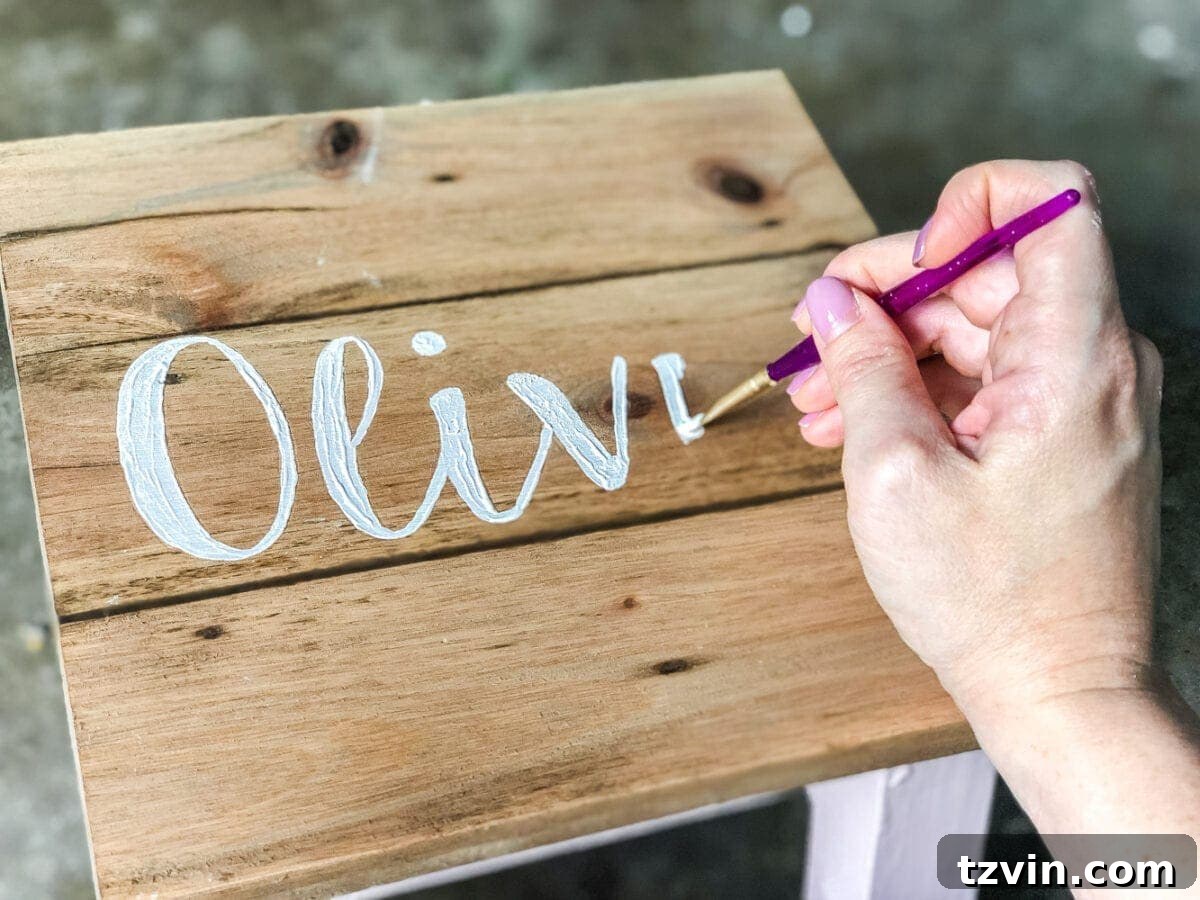 Craft Your Own Custom Step Stool 10 DIY Personalized Step Stools - Painting names on custom step stools. #personalizedstepstool #diysign #diymonogram