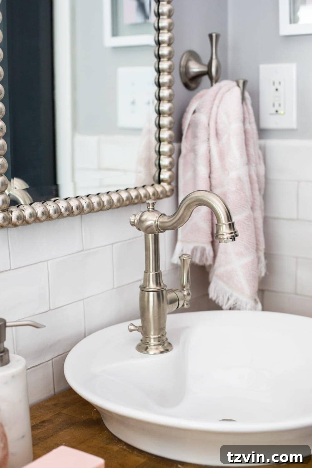 Tiny Humans Big Bathroom Makeover 13 Dual American Standard Morning vessel sinks on a butcher block console vanity