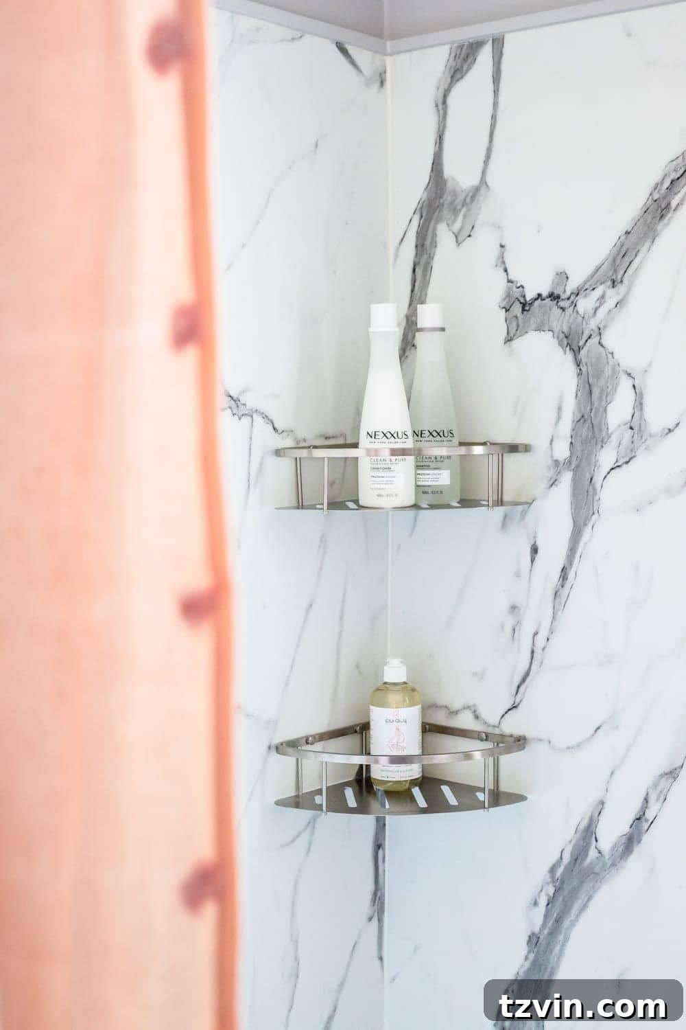 Tiny Humans Big Bathroom Makeover 10 Close-up of faux marble shower walls with integrated shelving for toiletries