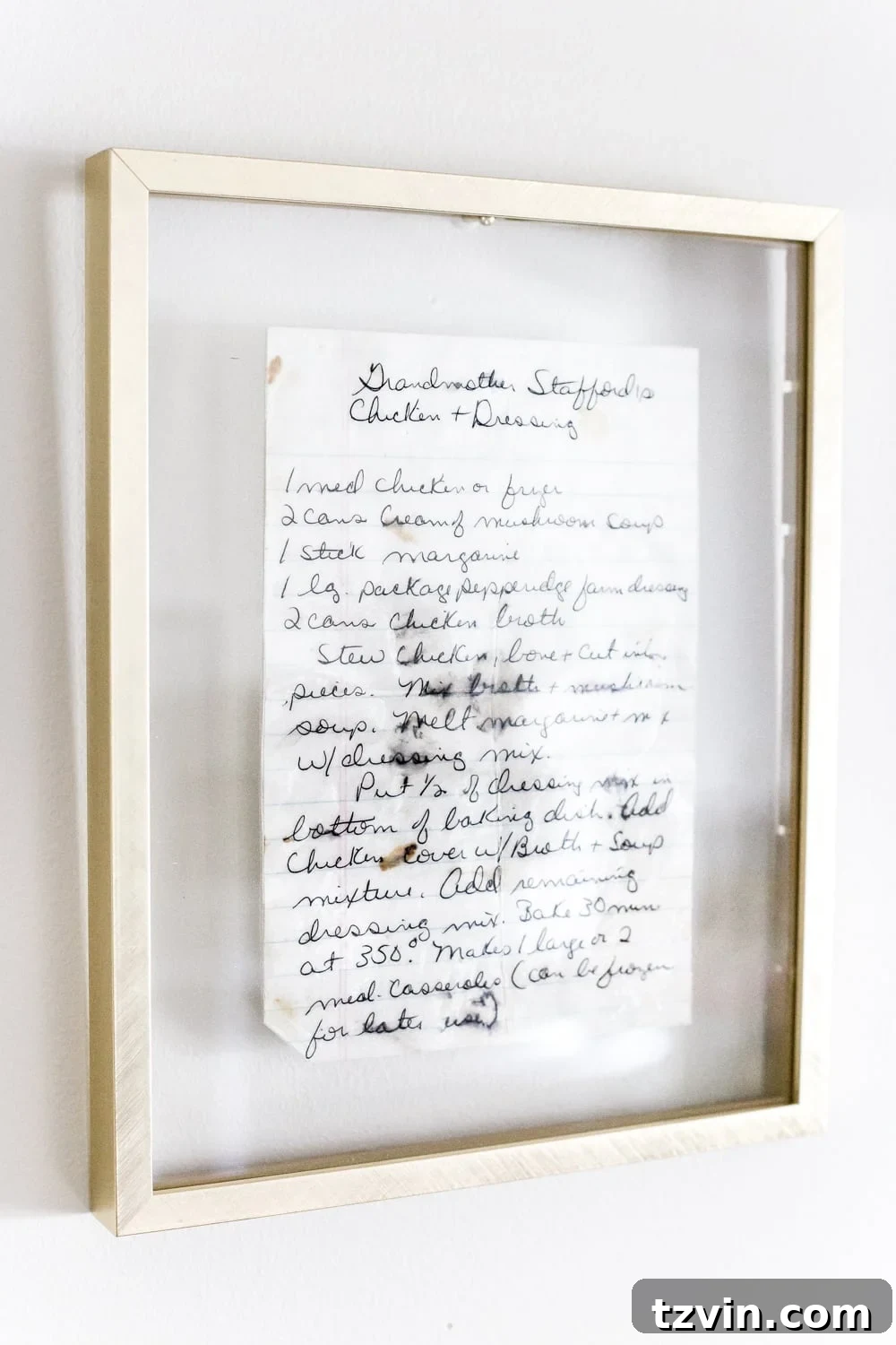 8 Personalized Art Ideas to Warm Your Home 13 Sentimental art idea - detail of beautifully preserved and framed handwritten recipes, showcasing unique handwriting