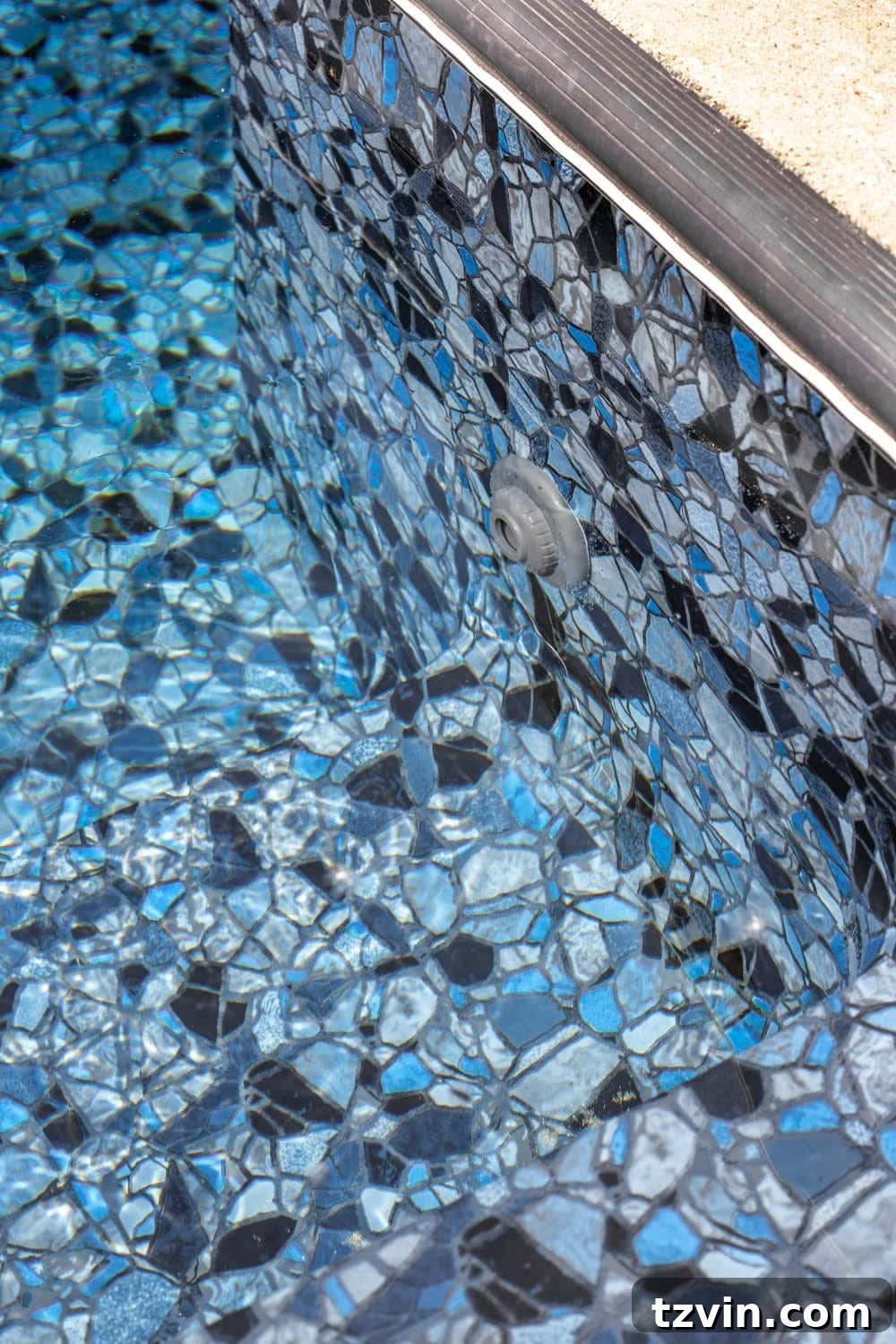 Close-up of ColorMagic eyeball fittings blending perfectly with the Obsidian pool liner
