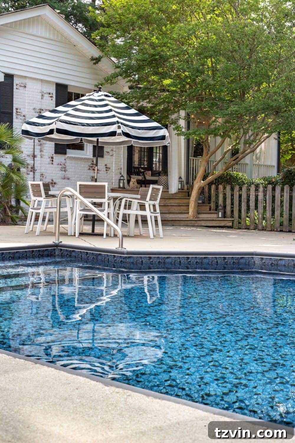 Stunning view of the new Obsidian pool liner, reflecting the summer sky