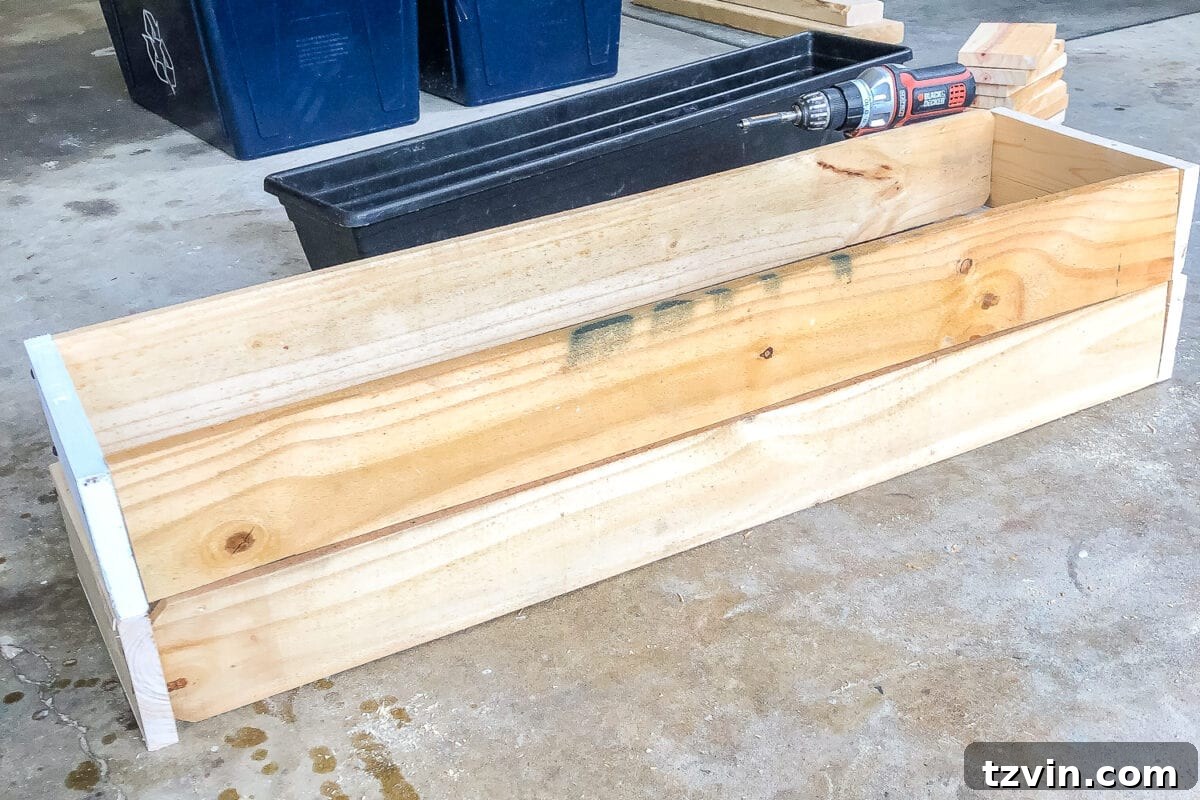 From Scraps to Blooms: DIY Window Planter 11 diy window box using scrap wood
