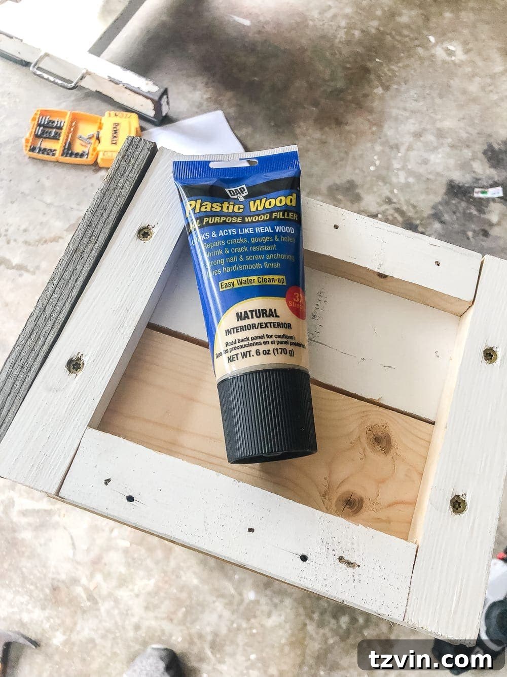 From Scraps to Blooms: DIY Window Planter 17 wood filler on window box