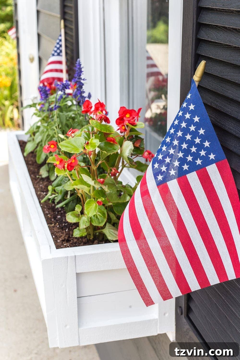 From Scraps to Blooms: DIY Window Planter 23 DIY window box using scrap wood with red, white, and blue patriotic flowers for July 4th
