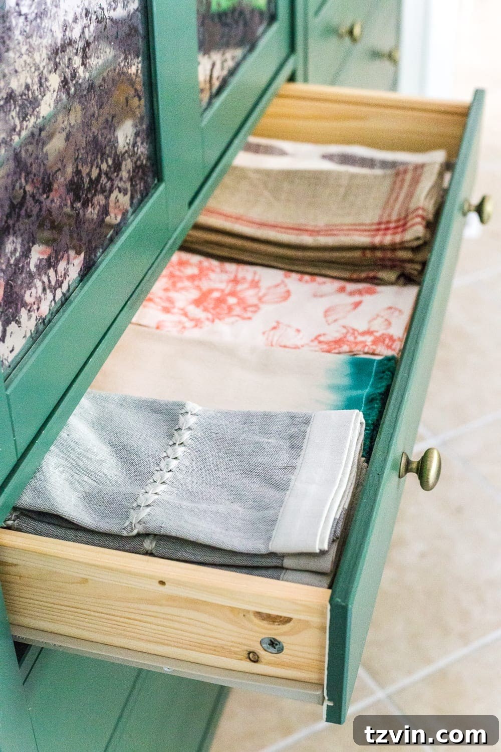 Ultimate IKEA Hemnes Pantry Cabinet Organization 12 Dedicated section in IKEA Hemnes pantry for table linen storage, neatly organized cloth napkins and table runners for special occasions.