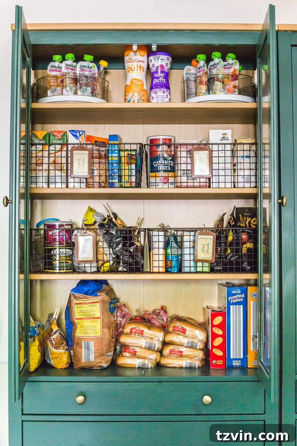 Ultimate IKEA Hemnes Pantry Cabinet Organization 4 Organized IKEA Hemnes pantry featuring wire baskets, offering clear visibility for food storage and maximizing cabinet space. Ideal for efficient kitchen organization.