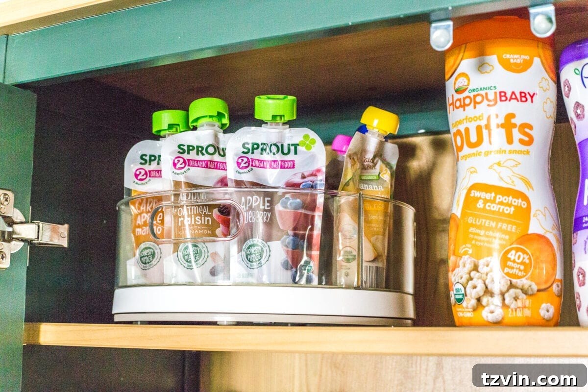 Turntable organizers in IKEA Hemnes pantry, ideal for small items like baby food and supplements, maximizing tight spaces efficiently.