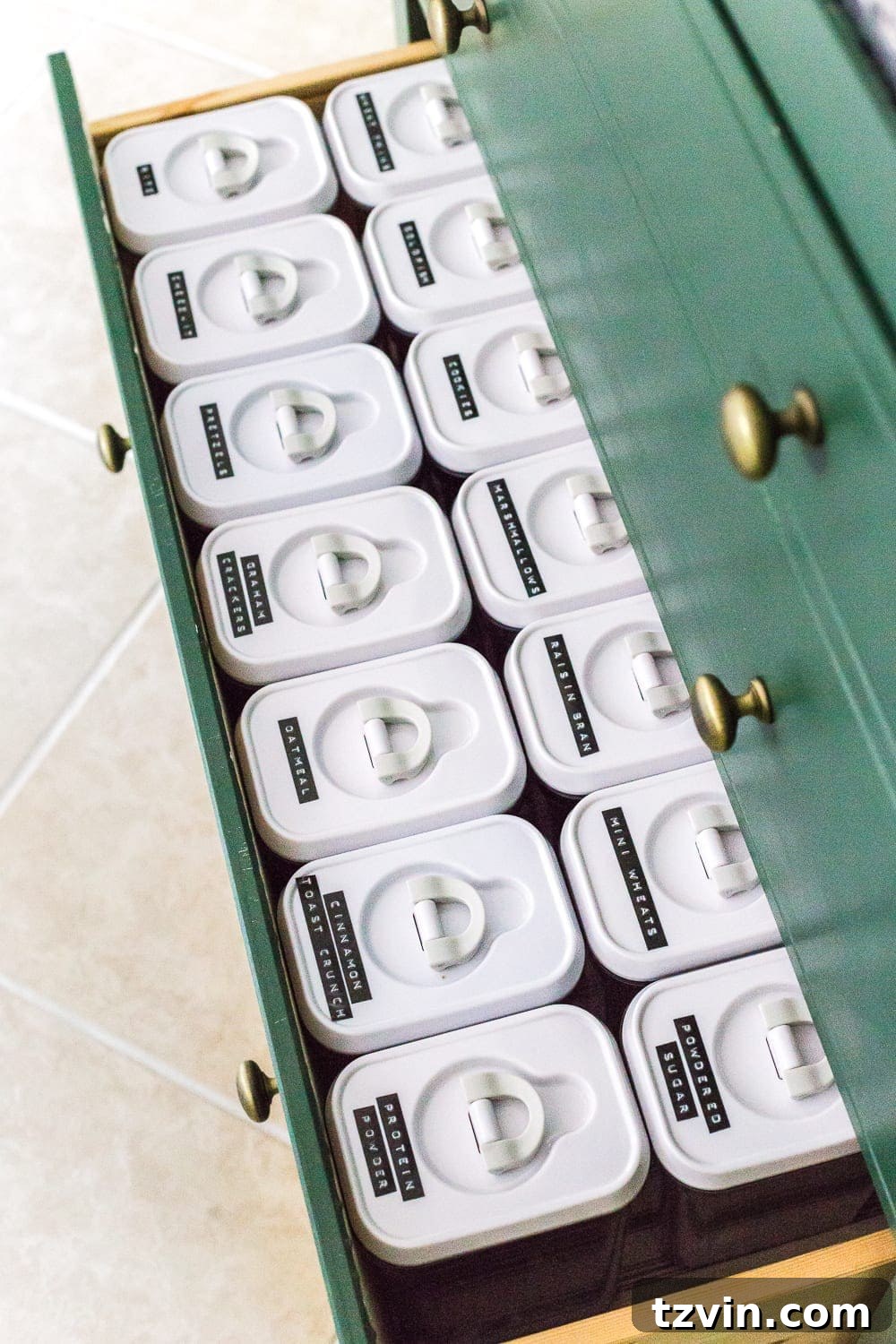 Ultimate IKEA Hemnes Pantry Cabinet Organization 10 Embossing label maker used to create 'old school' labels for pantry organization, adding both function and charm to storage solutions.