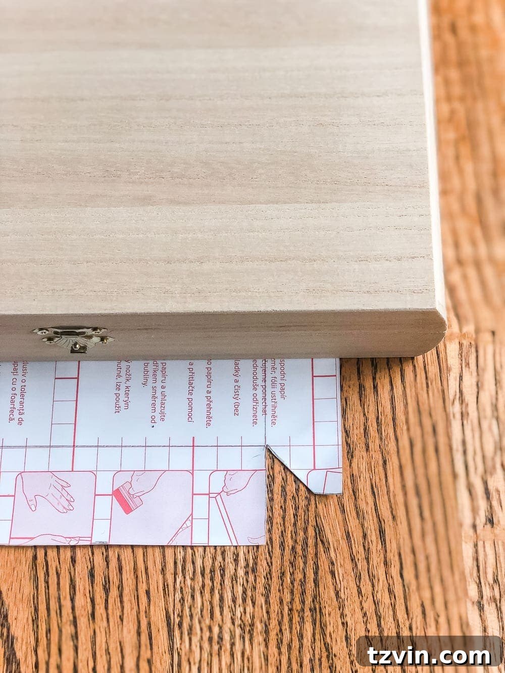 Elegant Faux Marble Remote Organizer: A Cigar Box Upcycle 6 How to wrap a cigar box with contact paper to repurpose into a decorative remote control holder for a coffee table. #remotecontrolholder #coffeetabledecor #craftingideas