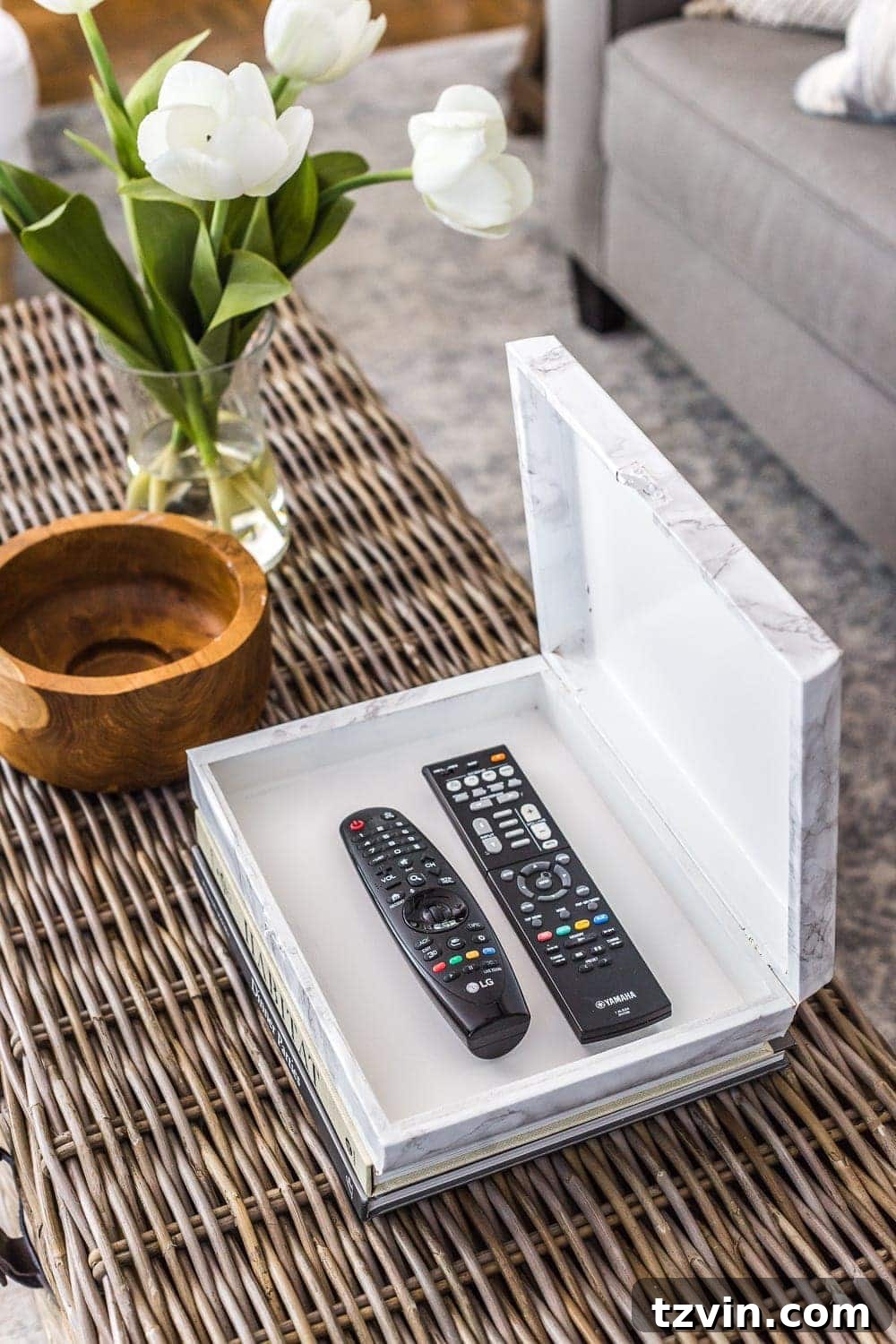 Elegant Faux Marble Remote Organizer: A Cigar Box Upcycle 9 How to wrap a cigar box with contact paper to repurpose into a decorative remote control holder for a coffee table. #remotecontrolholder #coffeetabledecor #upcycledcrafts