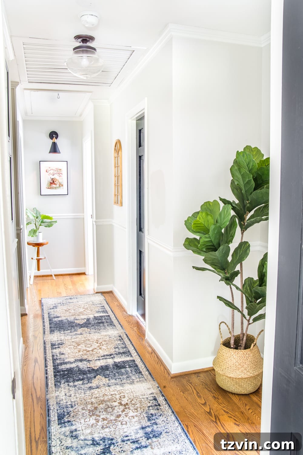 Big impact room decor by adding plants and greenery to a hallway
