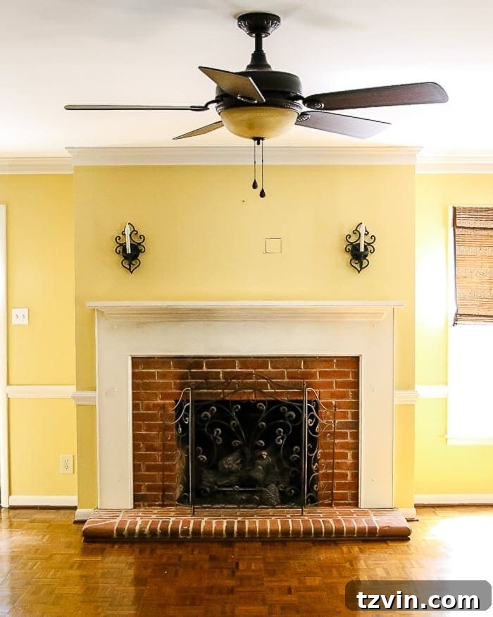 Change wall color for a big impact room refresh - Benjamin Moore Swiss Coffee walls with Wrought Iron trim