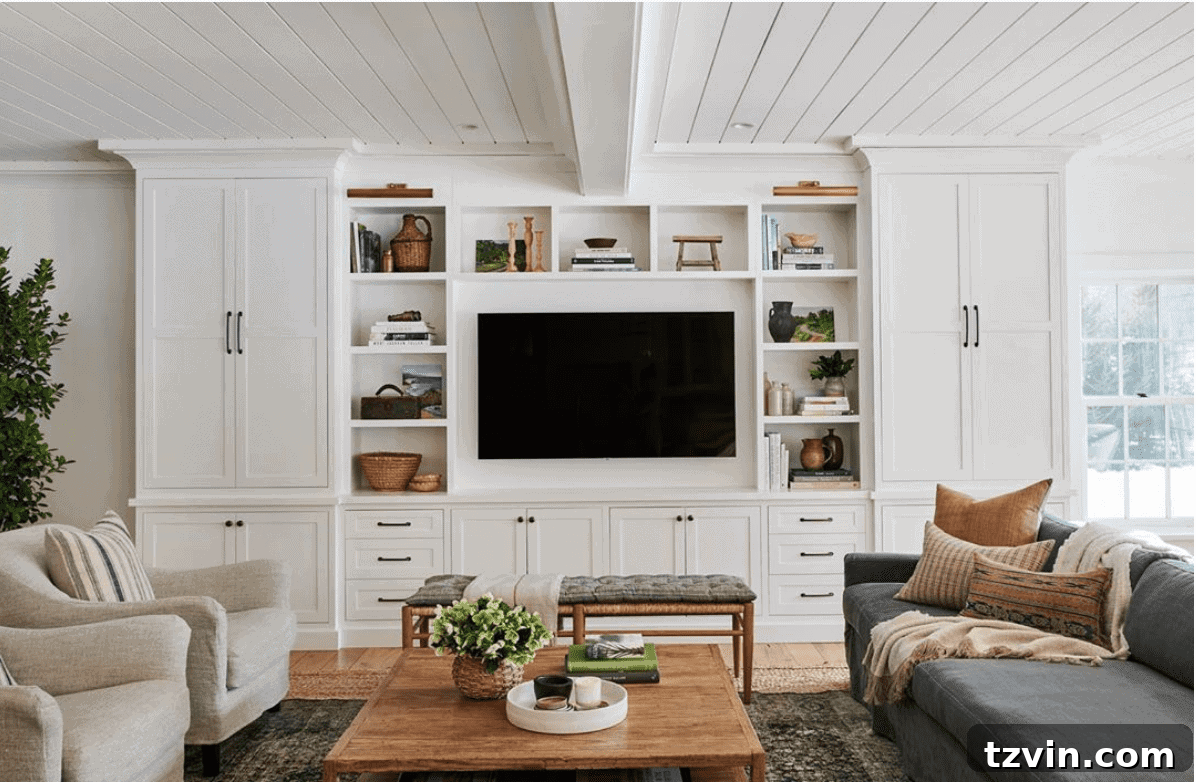 Beyond the Screen 12 Ways to Style Your TV Space 13 Television recessed into custom DIY built-in shelving from IKEA bookcases